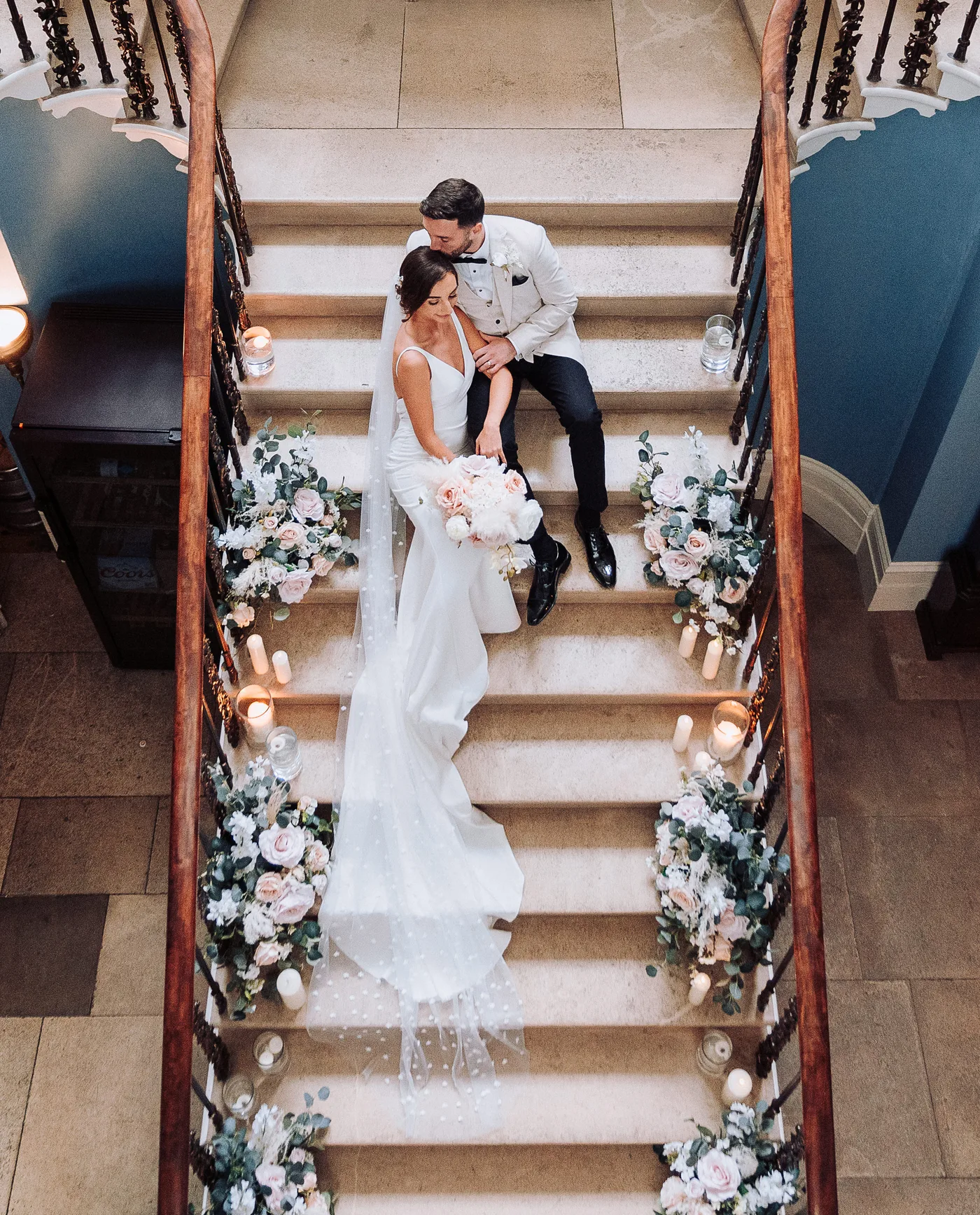 Bride groom on drenagh stairs