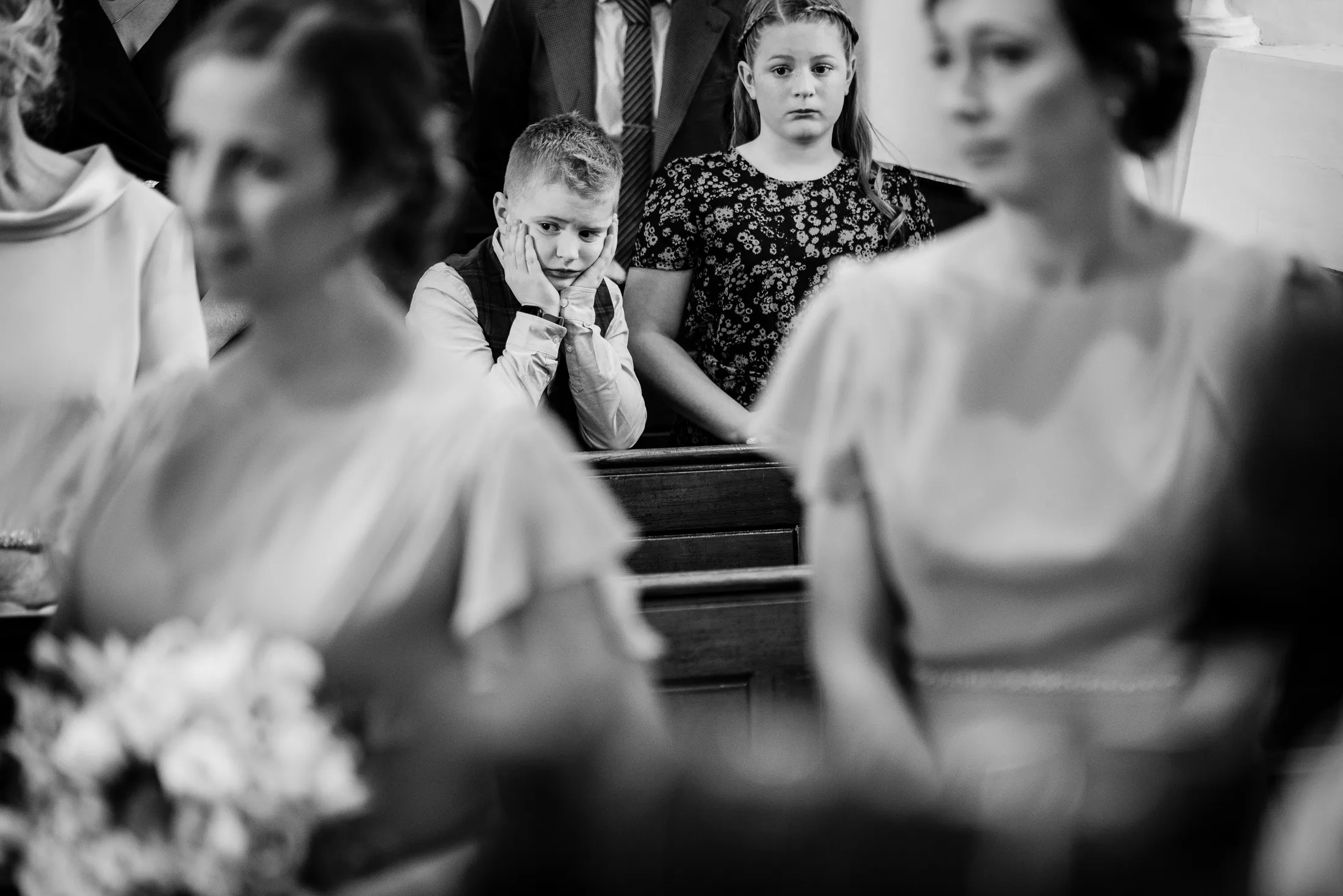 Kid bored at wedding ceremony