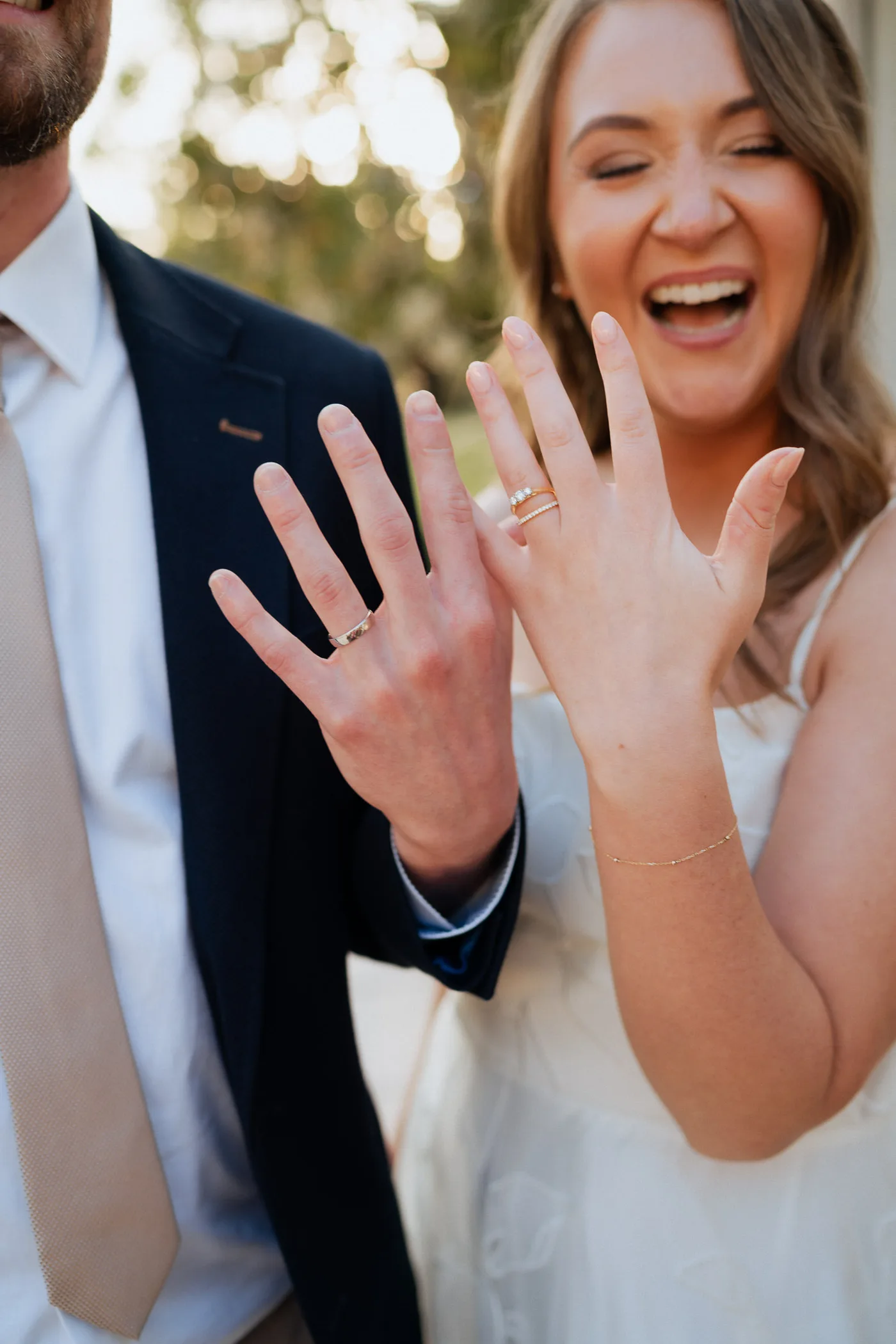 Newlyweds showing off rings